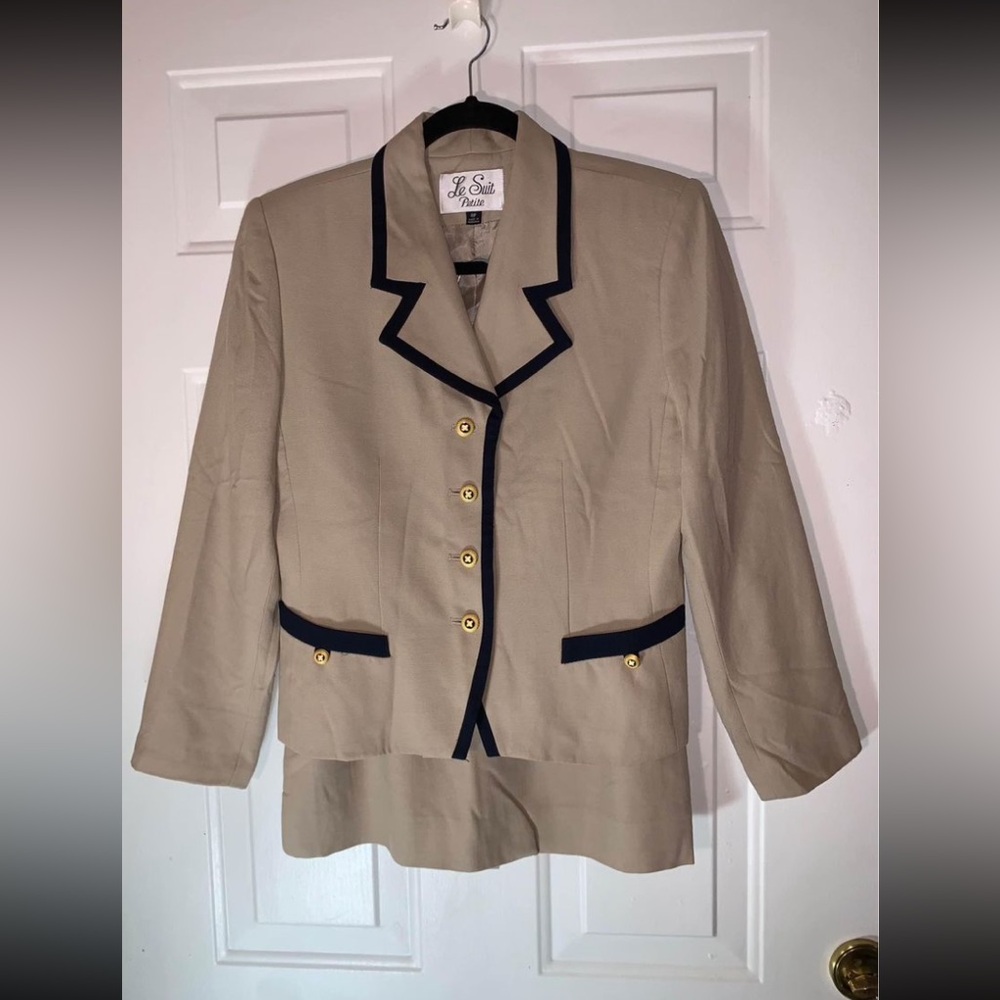 Lovely tan suit.